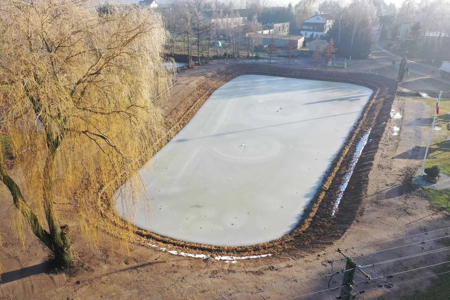 Przebudowa zbiornika wodnego o charakterze retencyjnym na dzialce nr ew. 129 w m. Dębień, gmina Rybno - po